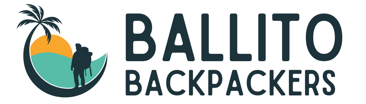 Logo for Ballito Backpackers featuring a backpacker on the beach and a palm tree